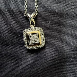 14k and sterling silver pendant and chain with genuine diamonds